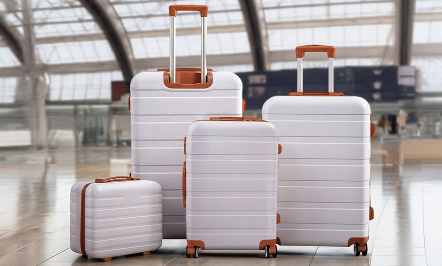 Image 1: Living And Home 4-Piece ABS Suitcase Set with Password Lock