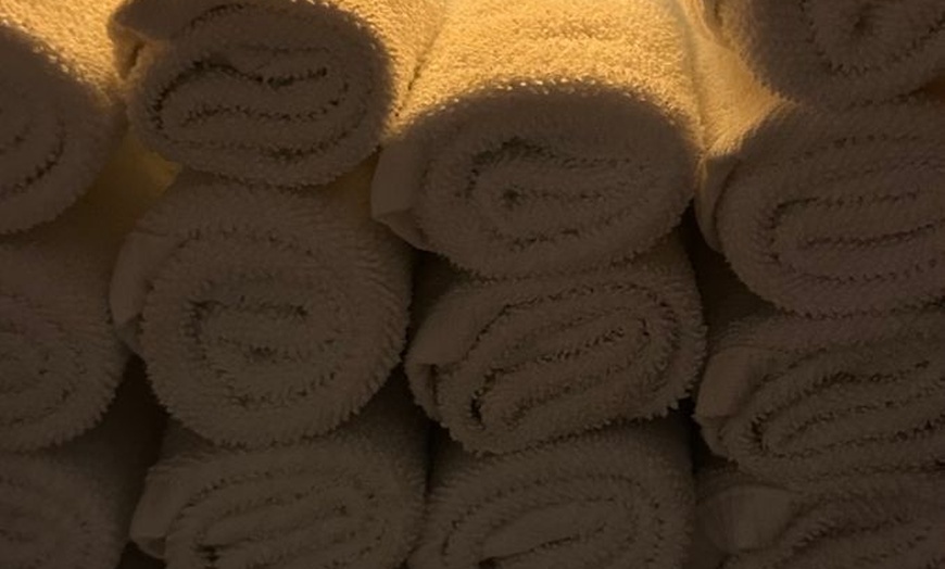 Image 6: Up to 67% 
Unwind with a massage designed to restore balance. 