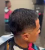Up to 38% Off on Salon - Men's Haircut / Barber at Blurred Blendz HTX