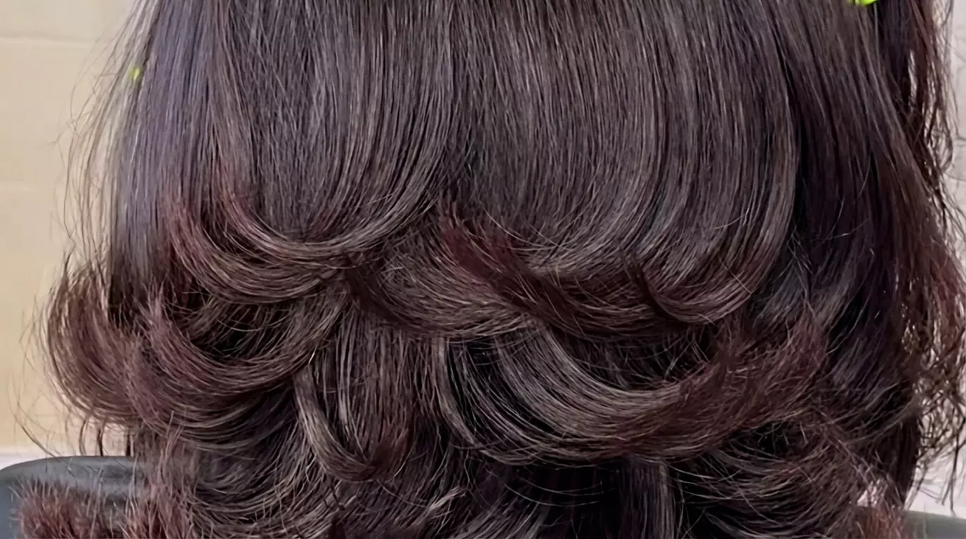 One Blowout with Deep Conditioning Treatment or Haircut and Blowout