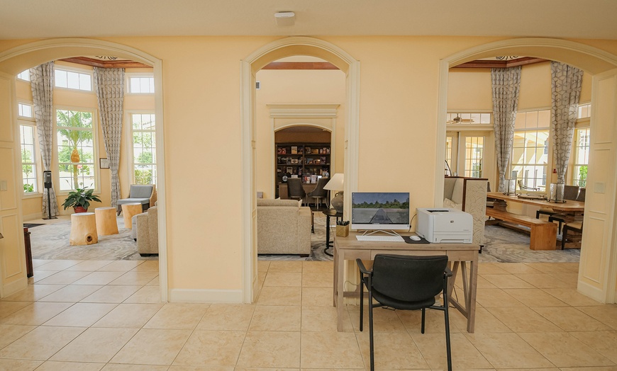 Image 23: Condo Resort With Mediterranean-Style Suites & Pool