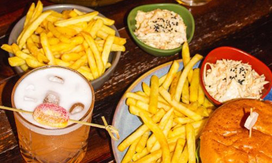 Image 1: Main Course with Glass of Wine, Beer, or Soft Drink at Saint Jude’s 