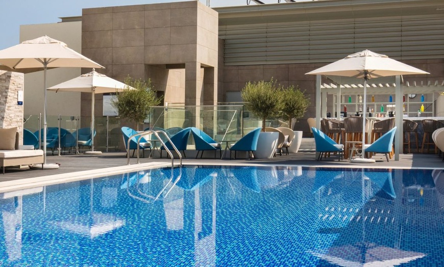 Image 2: Dive Into Relaxation: Pool Access with Set Menu