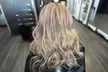 Up to 60% Off on a Haircut With Deep Conditioning Or Single Process Color Or Partial Highlights With Blowout - Second Medium
