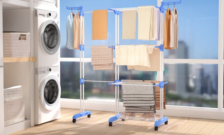 Image 6: Black or Blue Four-Tier Foldable Laundry Dryer Rack Indoor or Outdoor

