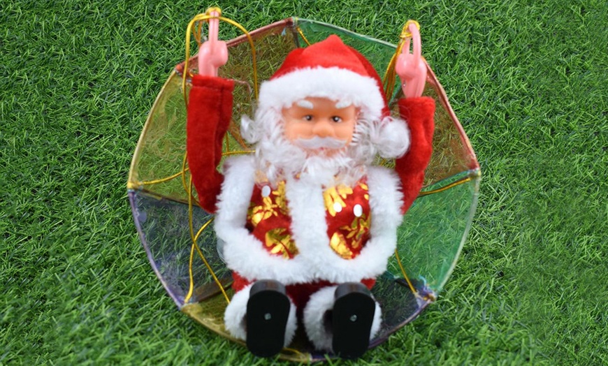 Image 2: Musical Tumbling Parachute Santa