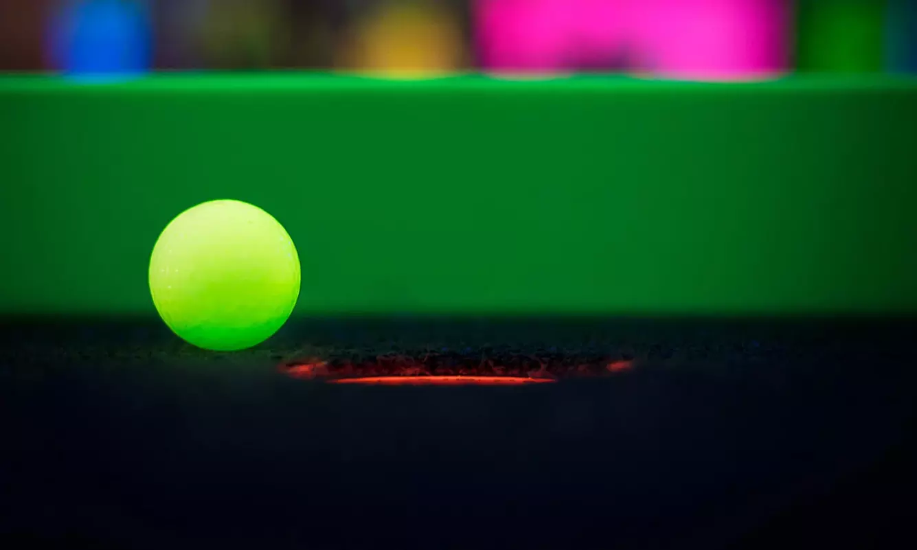 Glow-in-the-Dark Mini Golf with Vibrant Challenges – Norman