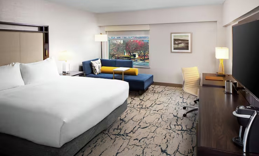 Image 7: Modern 4-Star Stay w/ Pool, Dining, & SNHU Arena Convenience