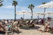 Beachside Fun: Sunbed Lounges, Paddle Board Adventures/More @Monty’s Dog Beach & Bar - Long Beach(Up to 30% Off) - Second Medium