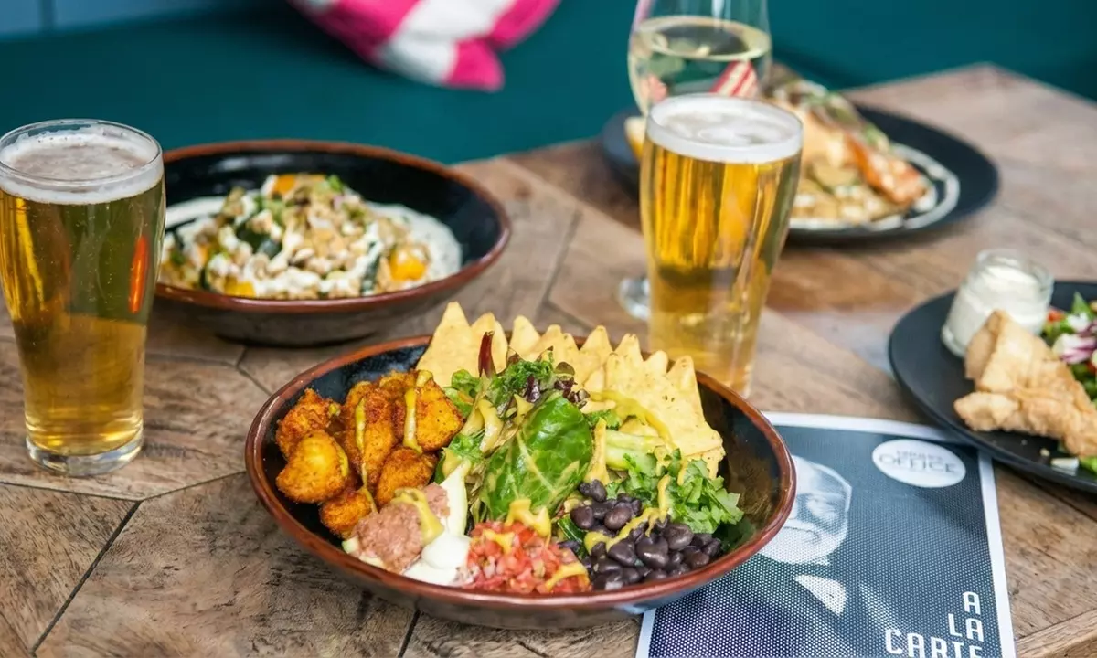 Experience 1920s Speakeasy Vibes with $150 or $250 Food & Drink Credit