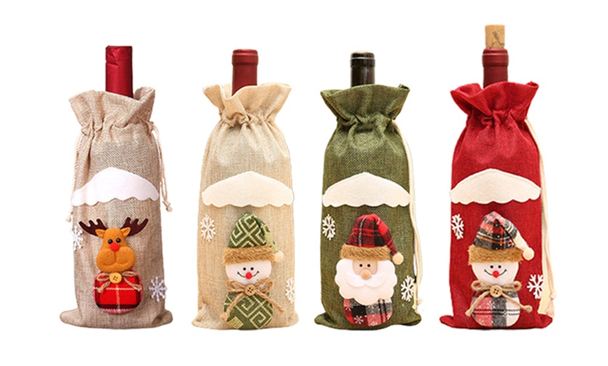 Image 2: One, Two or Four Christmas Wine Bottle Cover Bags