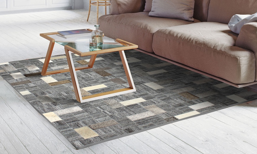 Image 8: Tapis en cuir 