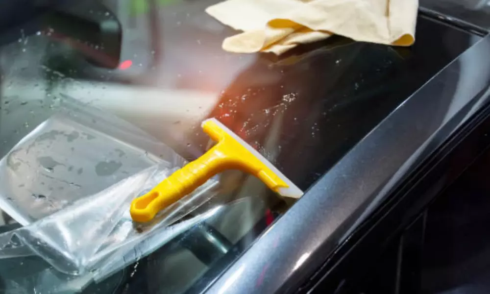 Window Tinting for 2 Windows or for 5 Windows for a 2 or 4-Door Car or Tint for Front Windshield (Up to 45% Off) - Primary Image