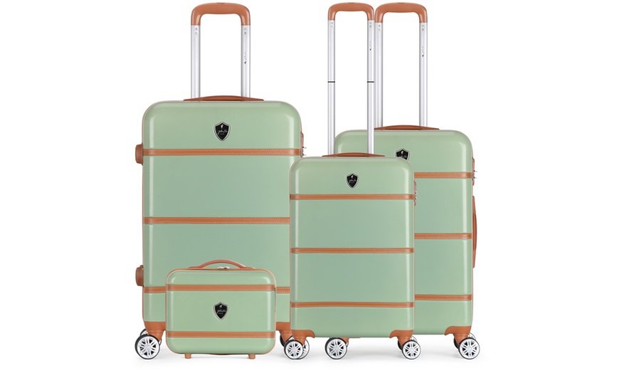 Image 16: Four Trolley Suitcases Set