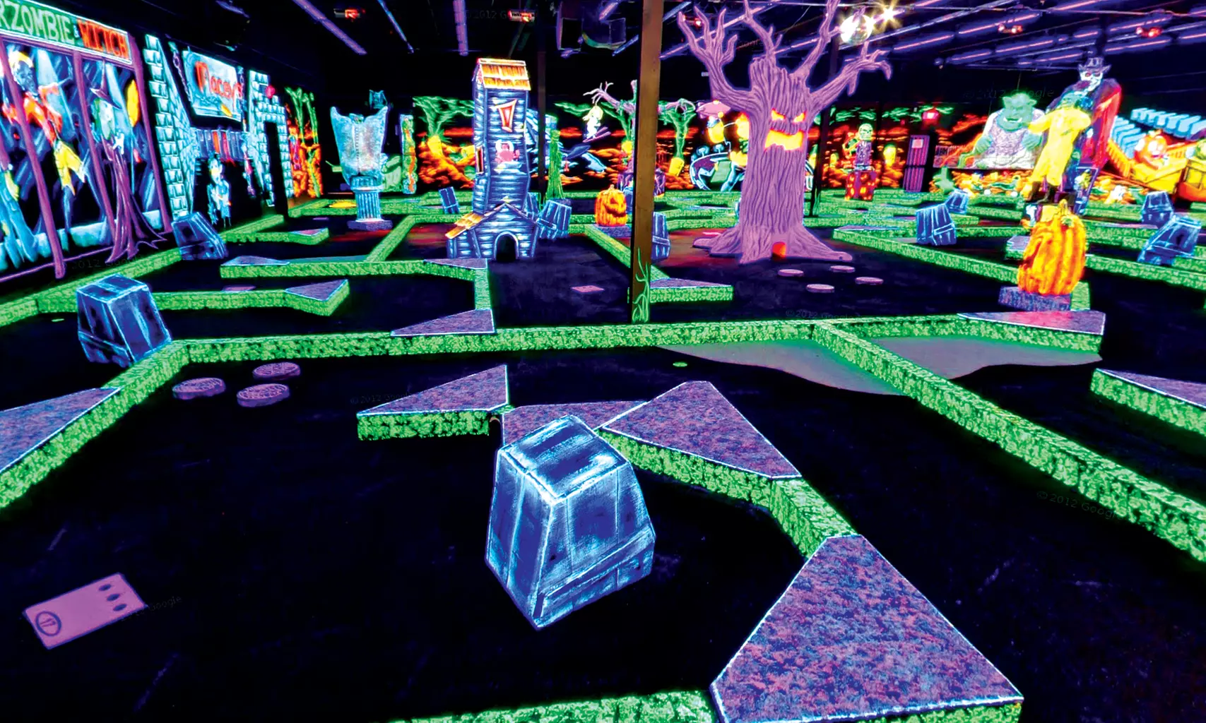 $18 for Four Rounds of Miniature Golf at Monster Mini Golf (Up to $36 Value) - Primary Image