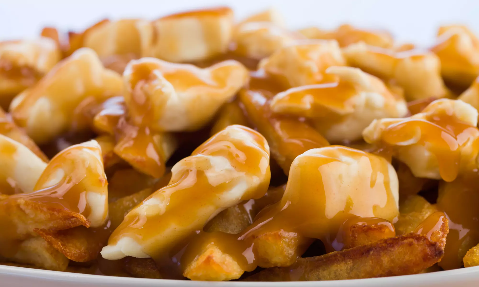 One or Three Groupons, Each One Good for Two Orders of Poutine at Mixture Poutine (Up to 58% Off) - Primary Image