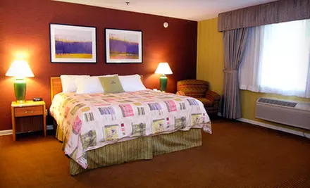 One-Night Stay for Up to Four in a Courtyard or Golf Room at Pheasant Run Resort in Chicagoland. Four Options Available. - Primary Image