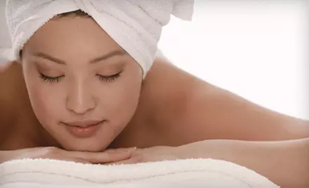 Signature Massage With or Without Chiropractic Exam or Facial at Om Spa Chiropractic and Wellness (Up to 76% Off) - Primary Image