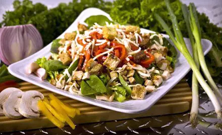 $10 for $20 Worth of Healthy Wraps, Entrees, and Smoothies at Muscle Maker Grill. Four Locations Available. - Primary Image