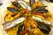 Paella, parillada de poissons ou viandes ou barbecue espagnol pour 2 personnes au restaurant Casa Paco - Second Medium