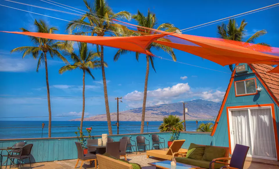 5-Night Stay with a Bottle of Champagne, Rose Petals on Bed, and Tropical Flowers in Room at Maui Sunseeker in Maui, HI - Primary Image