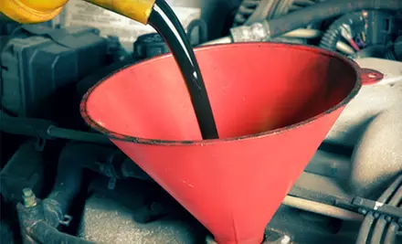 Standard, High-Mileage, or Synthetic Oil Change with Inspection and Tire Rotation at Robertson Tire (Up to 71% Off) - Primary Image