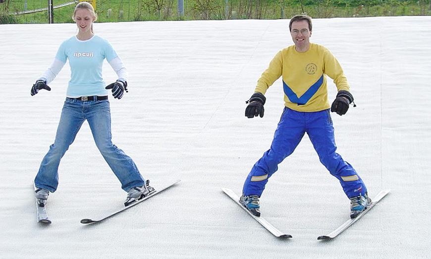 Image 2: Skiing or Snowboarding Lesson