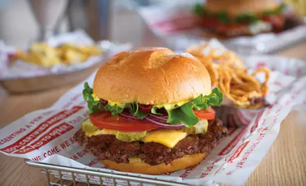 $6 for $12 Worth of Burgers and American Fare at Smashburger. Eight Locations Available. - Primary Image