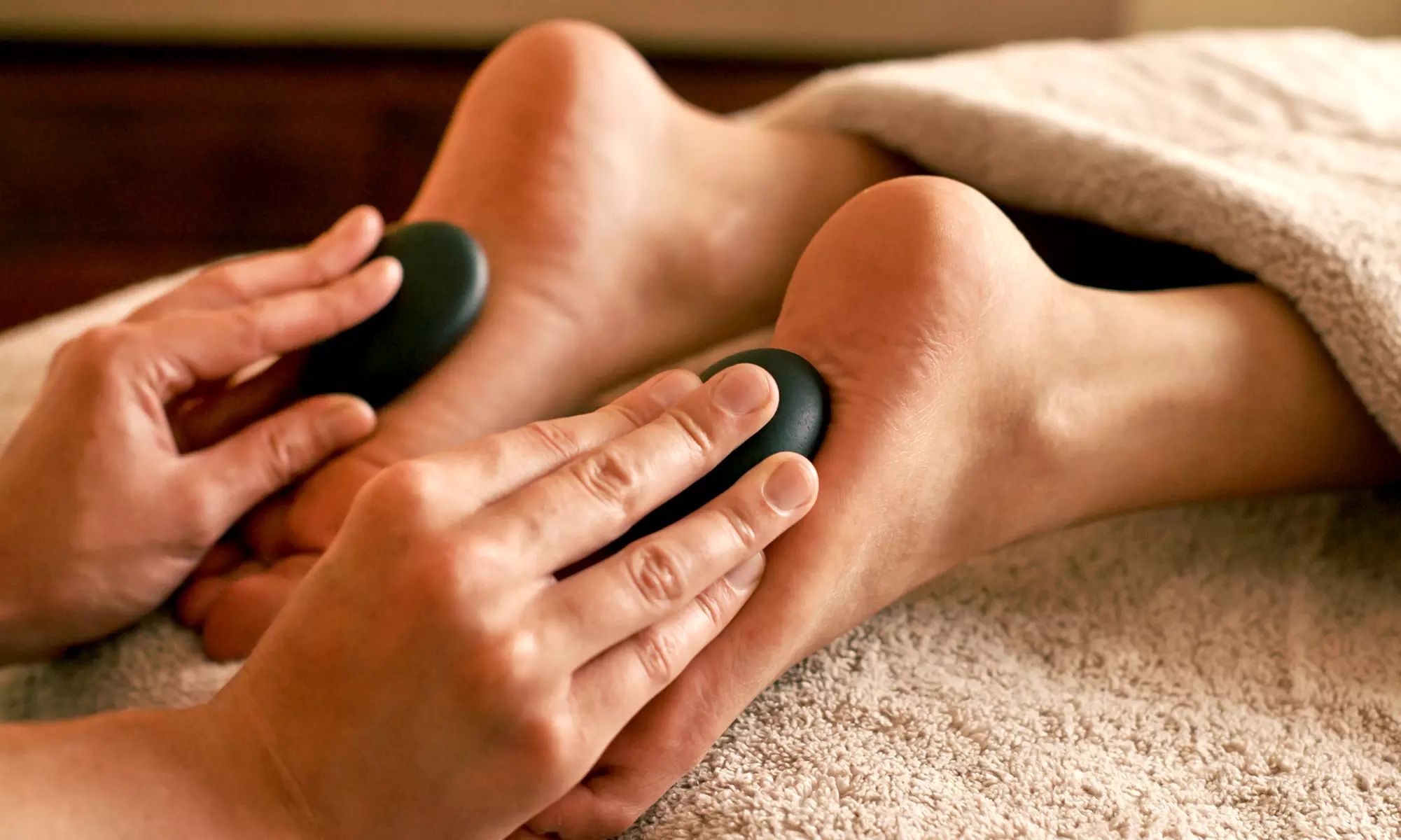 Enjoy a Massage and Hot Stones Combo to Relax and Unwind
