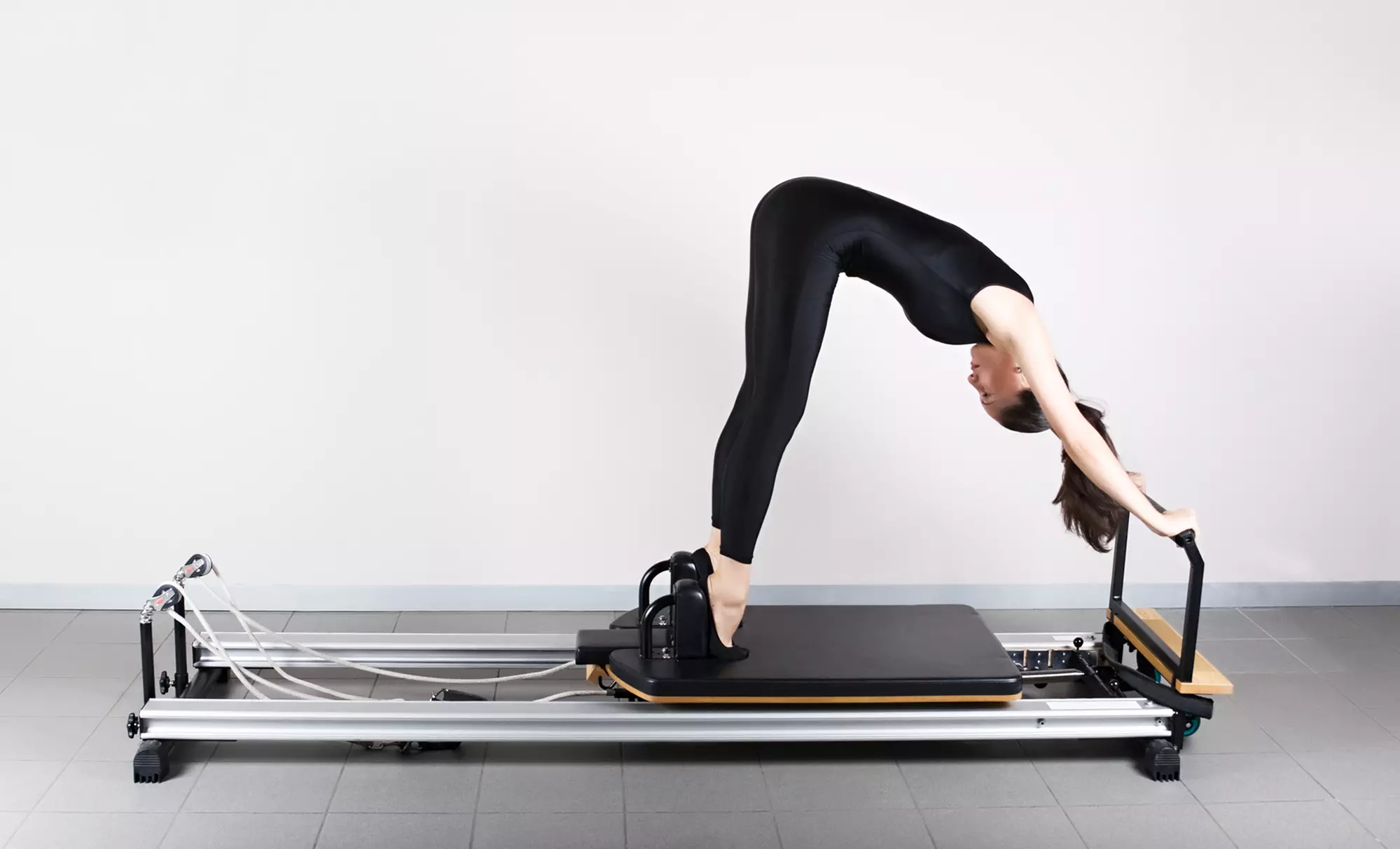 Three Introductory, Intermediate, or Advanced Pilates Reformer Classes at The Posture Bar (Up to 61% Off)  - Primary Image