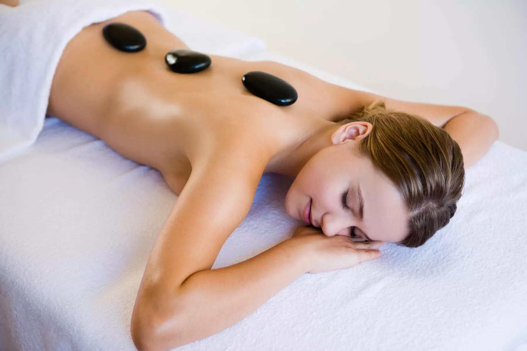Experience relaxation at Healing Touch Inc with a custom body massage or couples session, including hot stones, up to 21% off - Primary Image