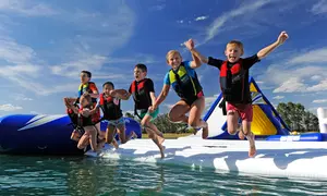 Dive into Excitement with One or Two 50-Min Sessions or All-Day Cables Aqua Park for One Person (Up To 25% Off)