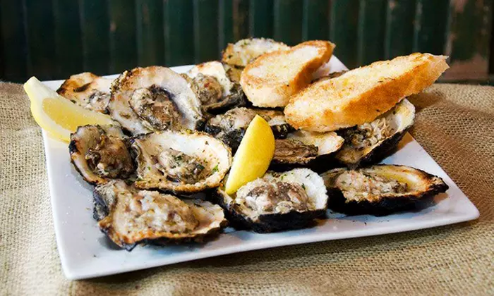 New Orleans–Style Food and Drinks for Dine-In or Takeout Dinner at NOLA Southern Grill (Up to 38% Off)  - Primary Image