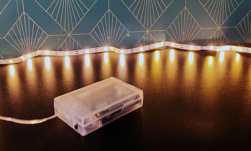 Image 6: Up to Four Packs of One-Meter Battery-Powered Adhesive LED Strips