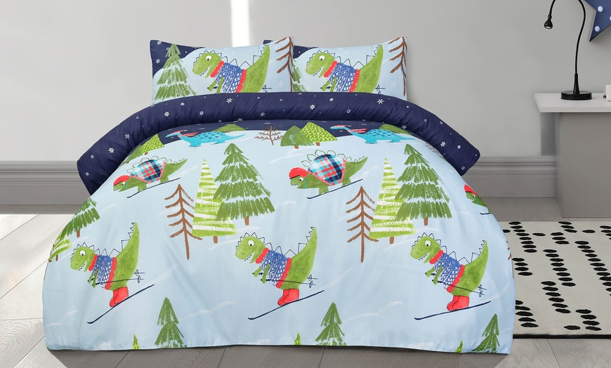 Image 1: Super Soft and Reversible Dino Skiing Printed Duvet Set