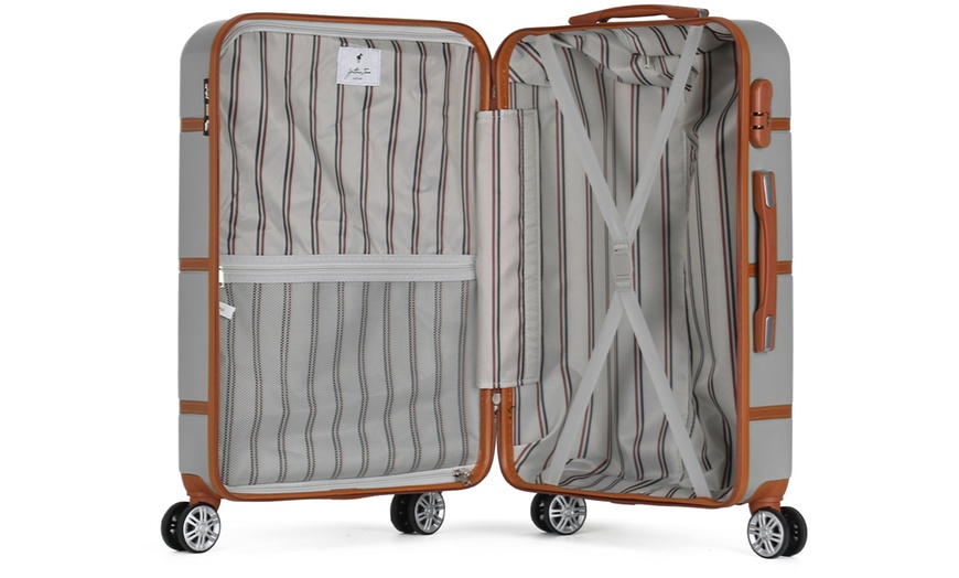 Image 12: Four Trolley Suitcases Set