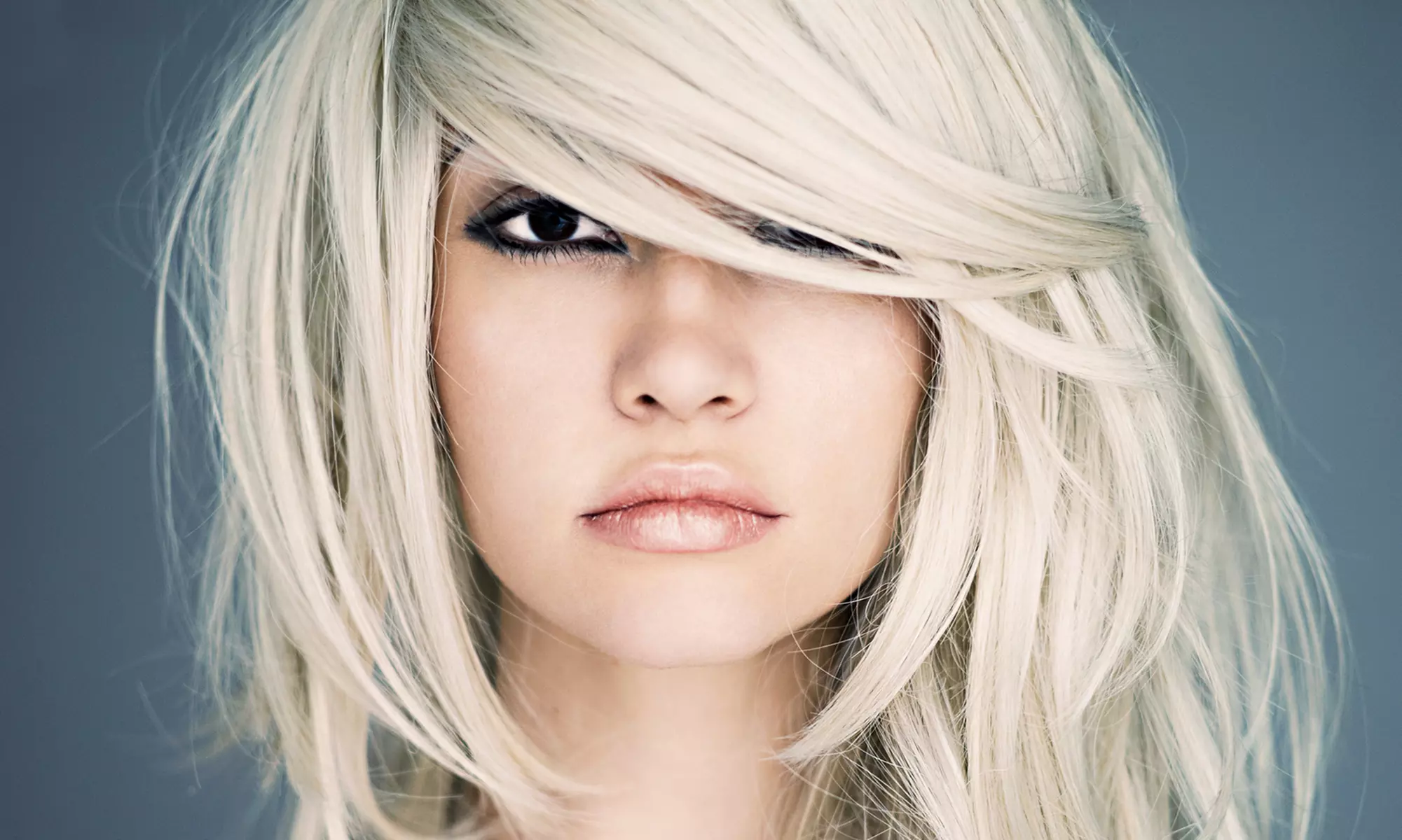 Haircut with Blow-Dry, Style, Protein Treatment, and Optional Partial Highlights at Studio K Salon & Spa (Up to 61% Off) - Primary Image