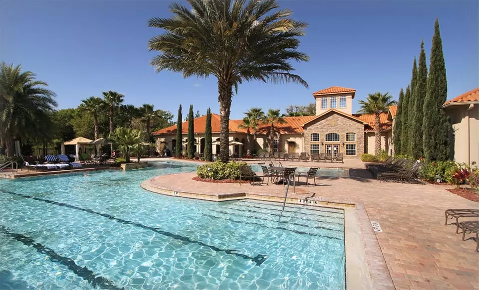 Stay with Four Drinks and Four Wildlife-Park Tickets at Tuscana Resort in Greater Orlando, FL. Dates into June.  - Primary Image
