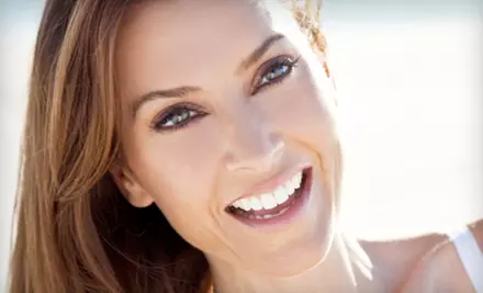 $2,399 for a Dental-Implant Package at Tufts Dental Associates ($5,000 Value) - Primary Image