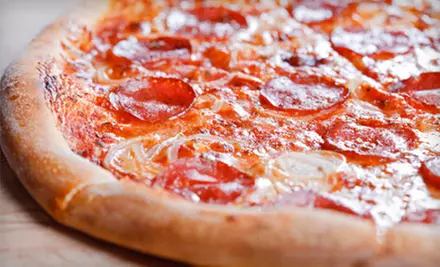 $7 for $14 Worth of Take-and-Bake and Ready-Made Pizza at Dean's Pizza in Turlock - Primary Image