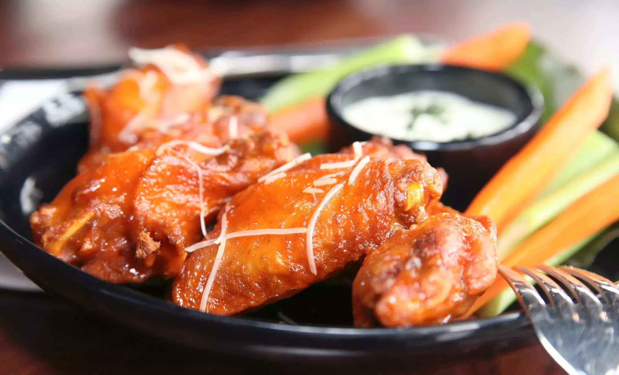 One Order of Wings with Purchase of 2 Large 1 Topping Pizzas at Pizza Bolis - Primary Image