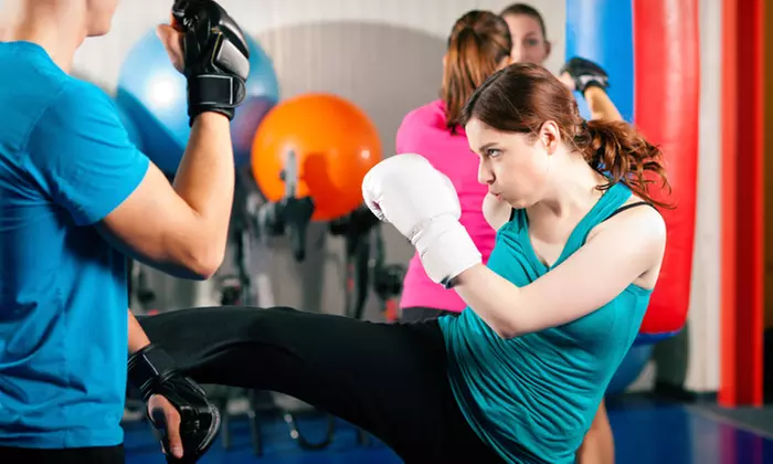 Experience up to 50% off with Karate World's engaging kickboxing classes, offering 5 or 10 sessions including gloves. - Primary Image