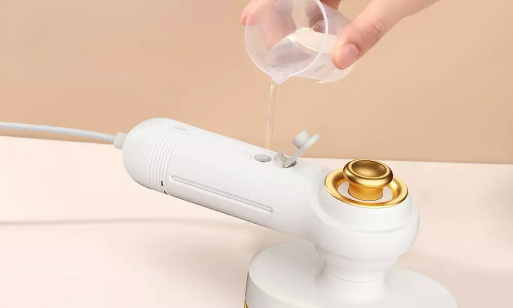 Plancha portátil de vapor y en seco con mango giratorio y depósito - Second Medium