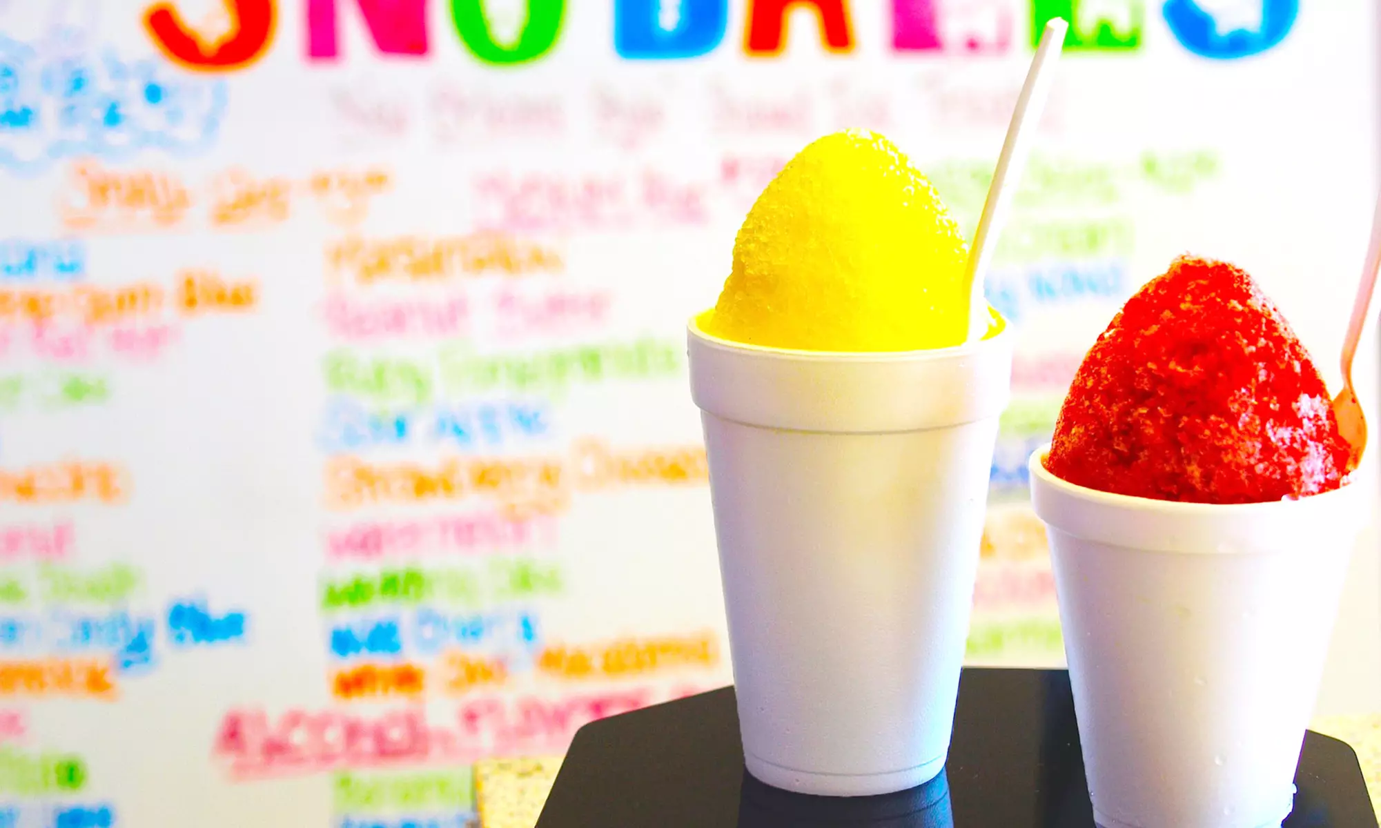 5 or 10 New Orleans–Style Sno-Ball Shaved Ice Treats and One Syrup at Snookies Cookies (45% Off) - Primary Image