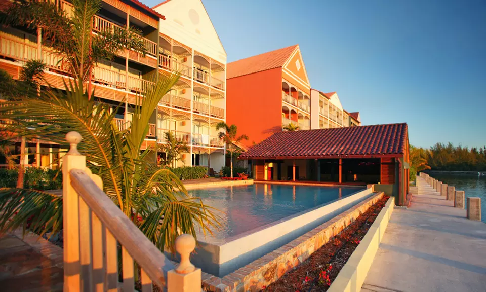 ✈ 4-Night Pelican Bay Hotel with Air from Vacation Express. Price per Person Based on Double Occupancy. - Primary Image