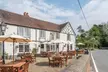 Savor Fish and Chips with a glass of Prosecco for One, Two or Four People at The Red Lion (Up to 52%Off) - Second Medium
