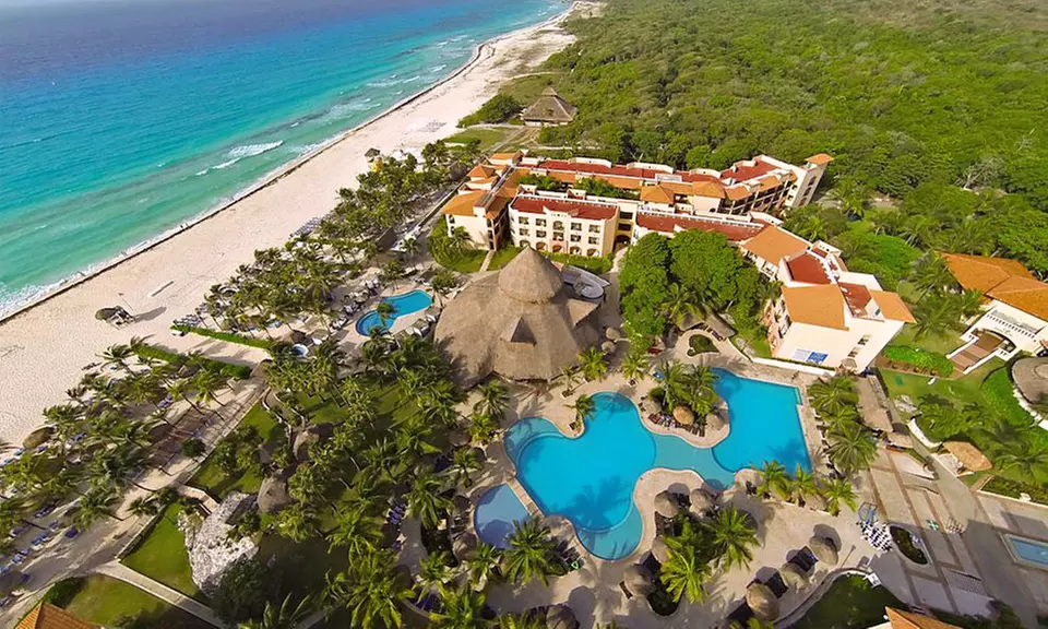 ✈ Sandos Playacar Beach Resort Stay w/ Air, Taxes & Hotel Fees. Price/Person Based on Dbl. Occ. (Buy 1 Groupon/Person). - Primary Image
