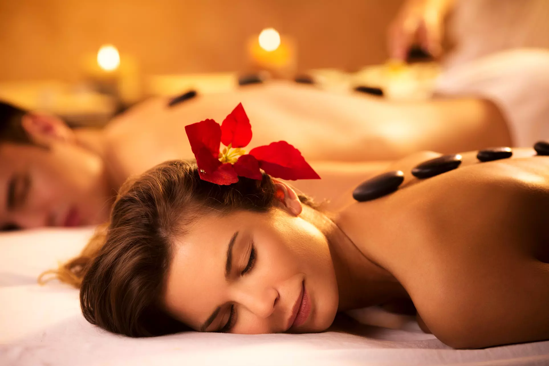 90-Minute Swedish Couple's Massage with Hot Stones and Ginger Oil at Silk Spa (Up to 23% Off) - Primary Image