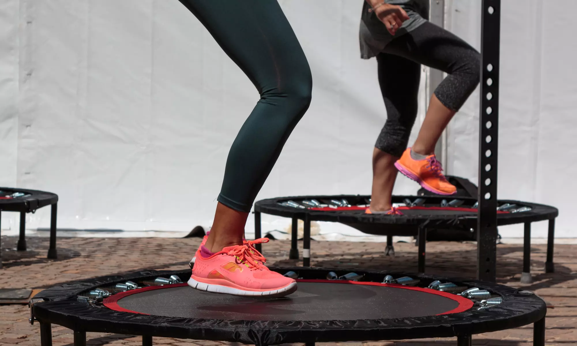 Experience Radical Rebounding's dynamic online trampoline workouts for all levels with up to 50% off, offering flexible fitness options. - Primary Image