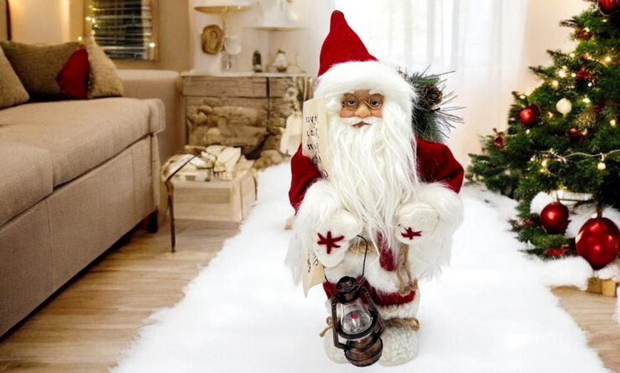 Image 7: Decoratieve kerstman met namenlijst